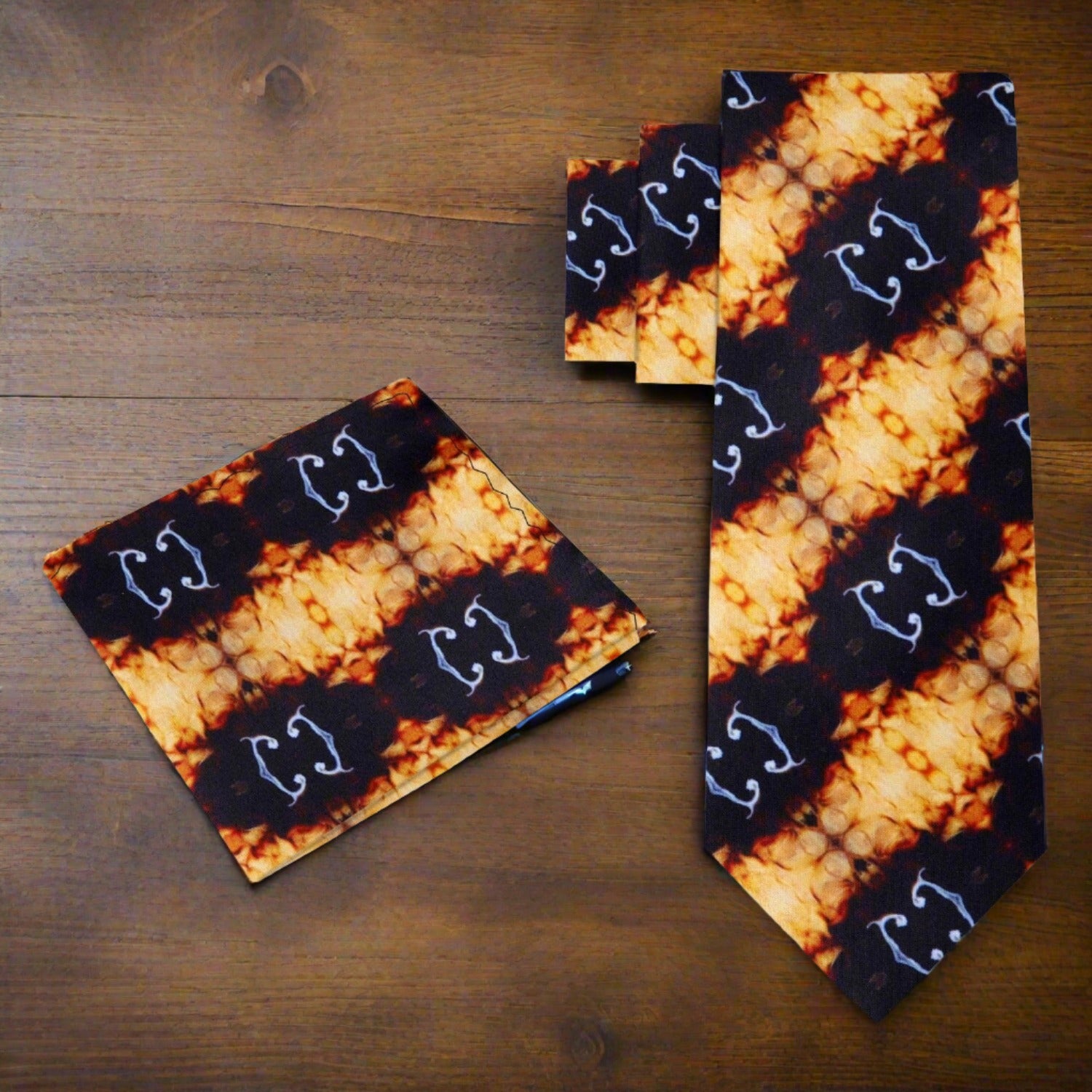 Caramel macchiato silk necktie displayed with a dark brown suit for a refined look.