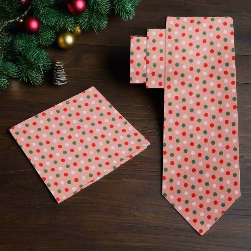 Close-up of a vibrant Christmas polka dot tie in red, green, and orange peach colors