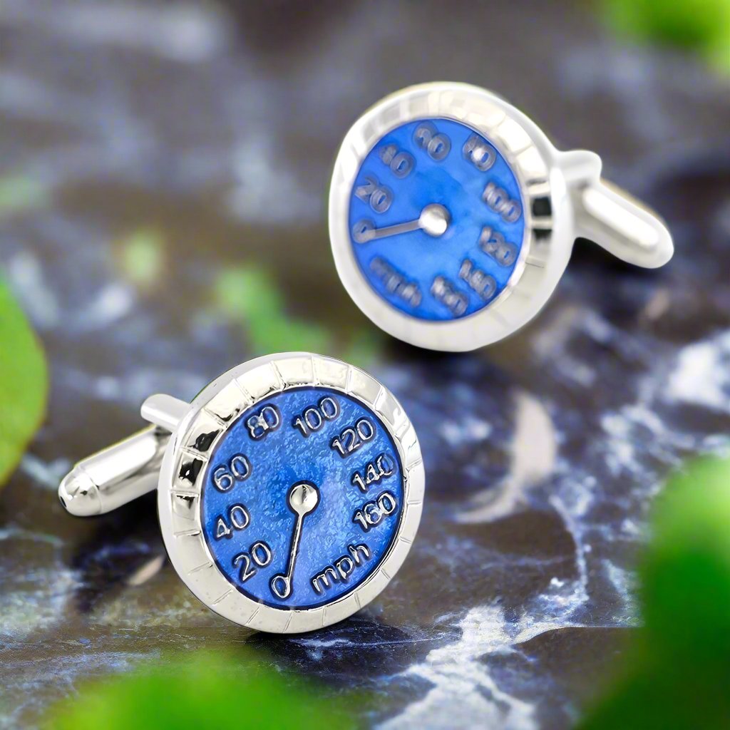 Close-up of cufflinks featuring race car steering wheel design, perfect for motorsport lovers