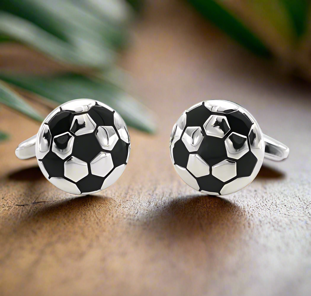 Cufflinks shaped like a basketball, perfect for sports lovers.