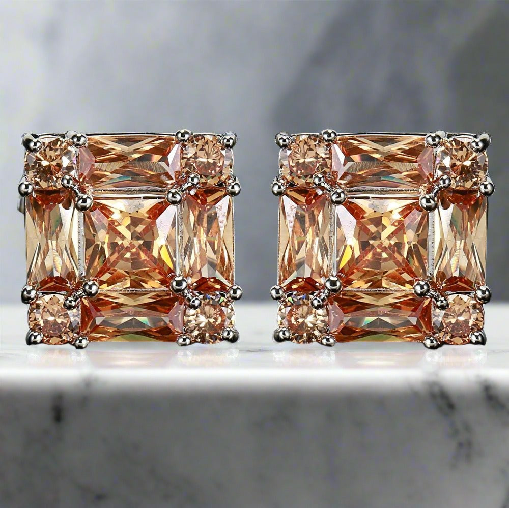 Close-up of men's gemstone cufflinks with red stone, ideal for formal wear