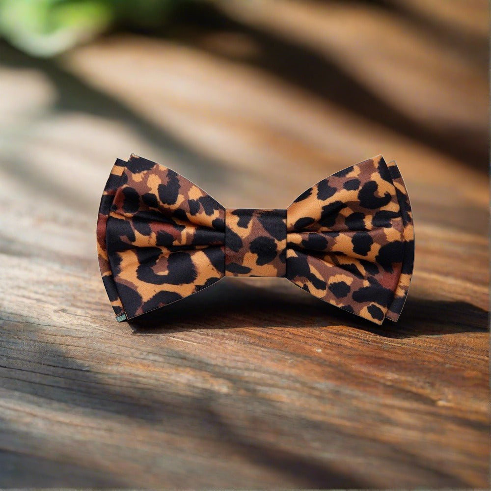 Elegant cheetah pattern silk bow tie styled with a dress shirt for formal events