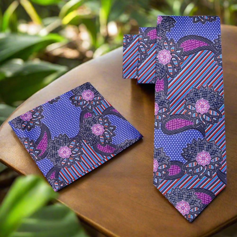Close-up of a silk necktie with blue and purple stripe and paisley pattern, ideal for formal occasions