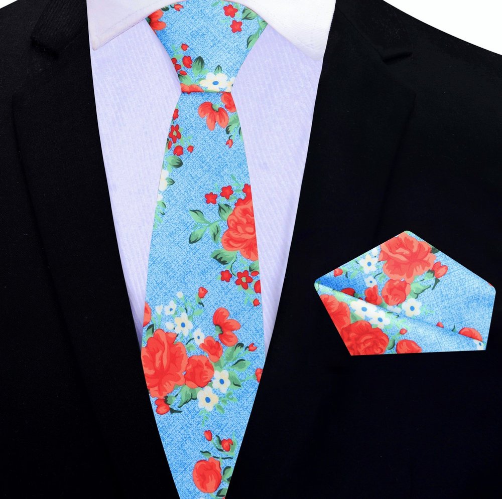 Elegant Floral Silk Necktie with red roses and green leaves, showcased against a plain background.