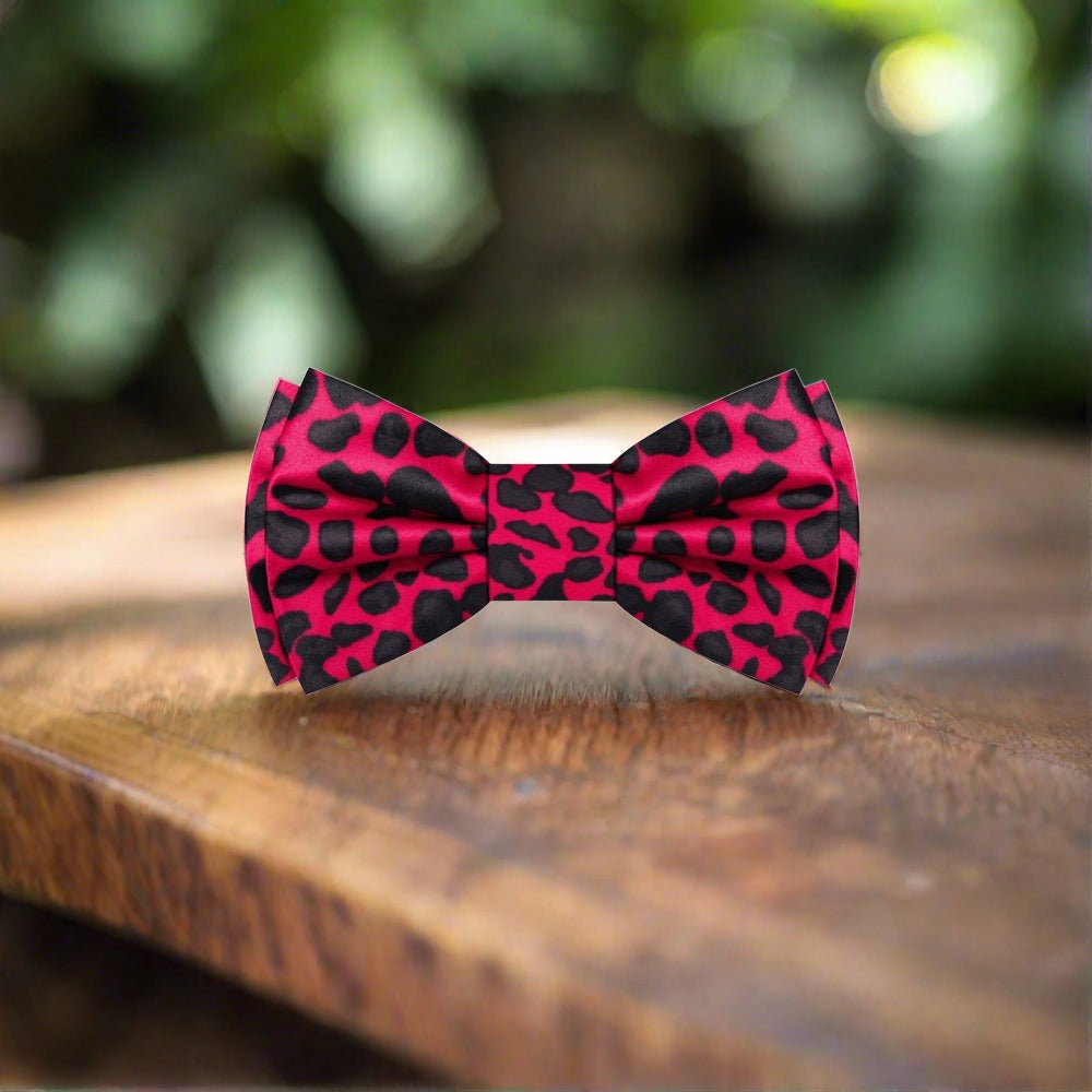 Mens bow tie featuring a bold cheetah print, perfect for weddings and parties