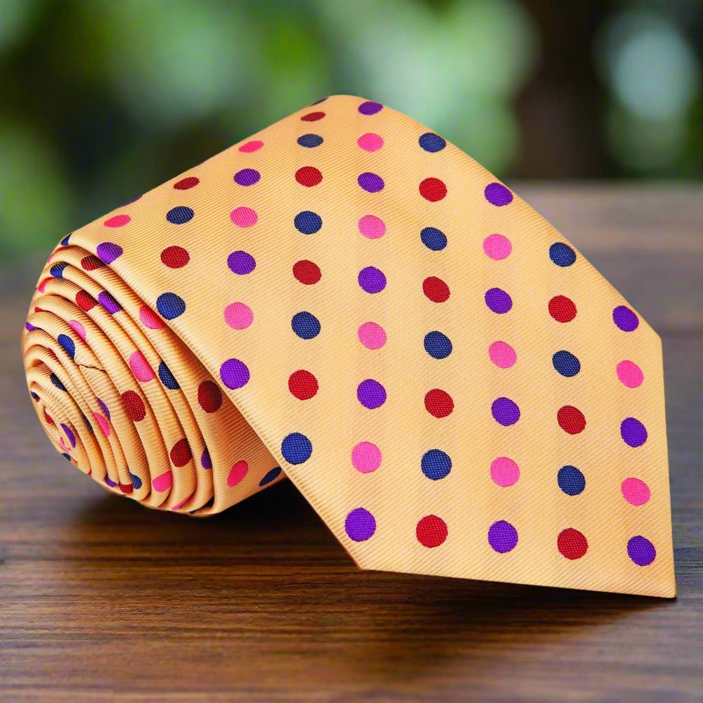 Stylish display of the polka dot silk necktie on a light grey suit, ideal for business meetings.