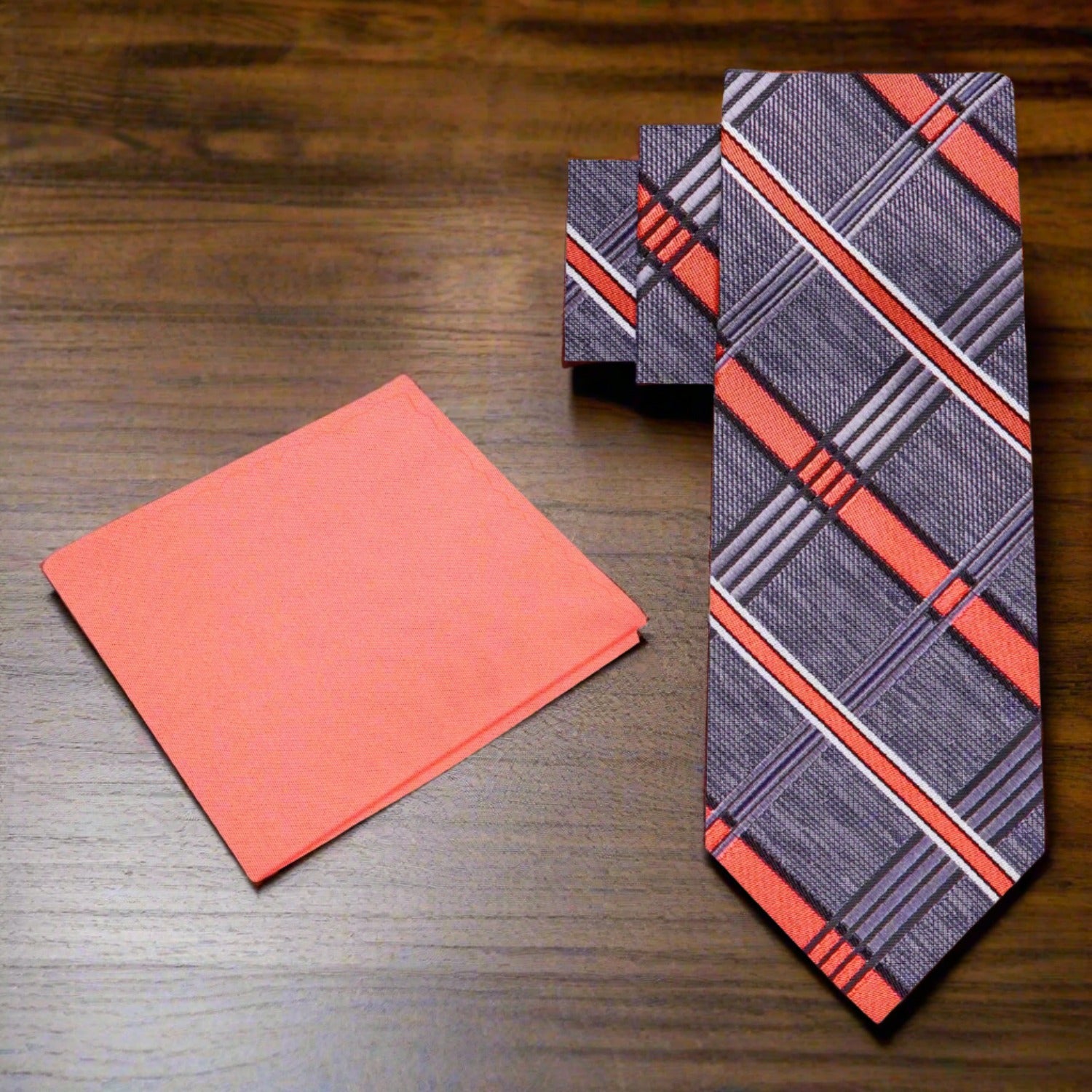 The necktie styled with a light blue dress shirt for a complete look.