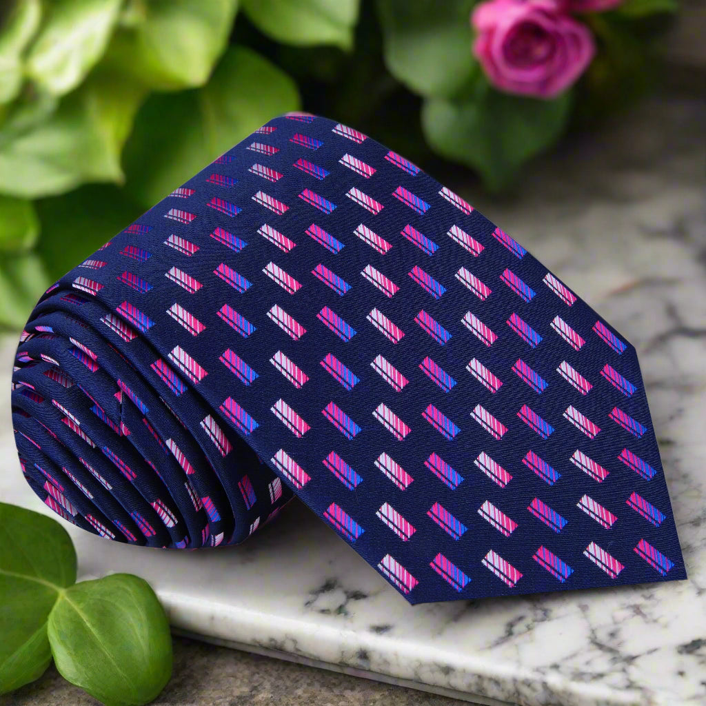 Wisteria Elegance Silk Tie displayed with a white dress shirt and navy suit, showcasing its vibrant check pattern.