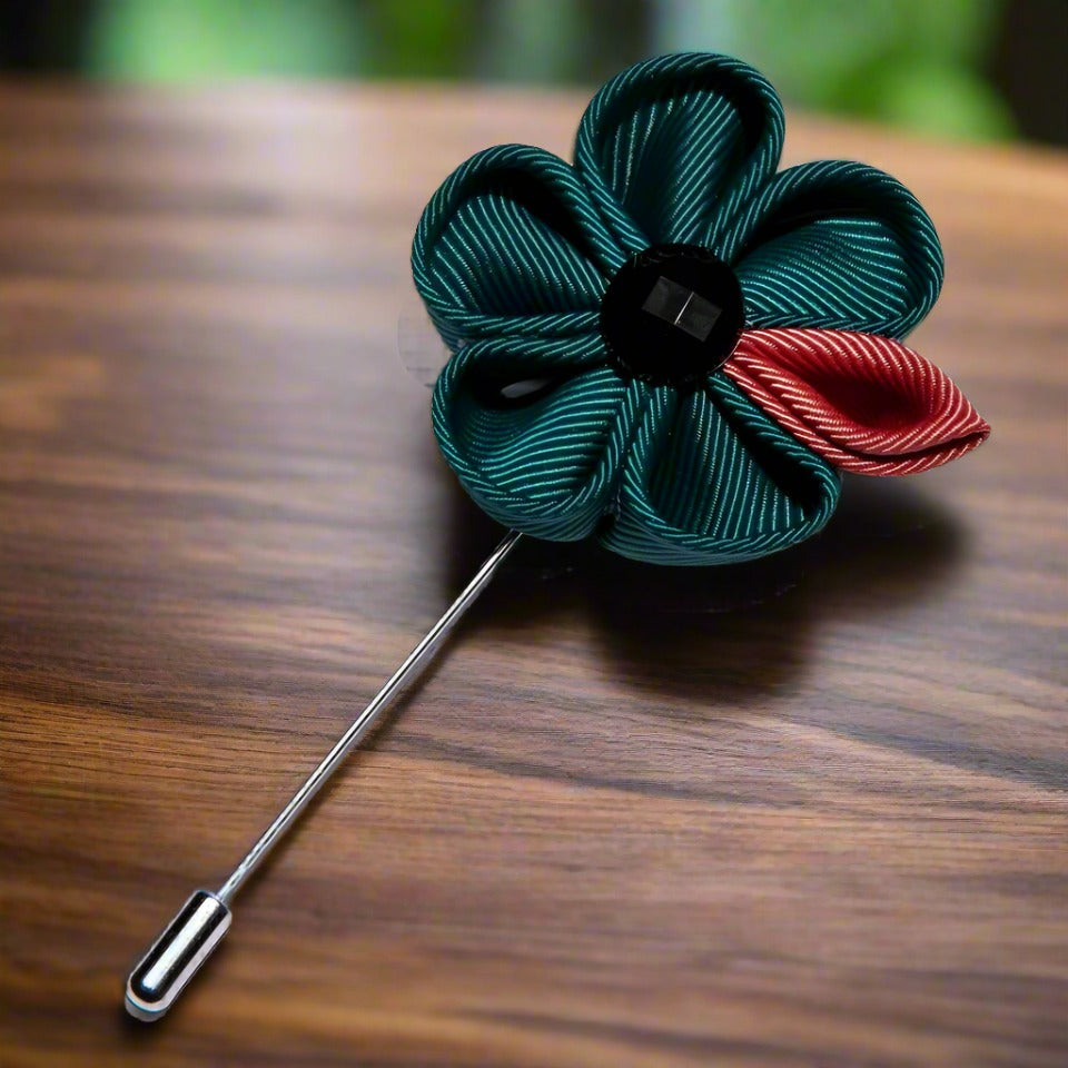 Elegant floral lapel pin in vibrant colors, ideal for men's attire.