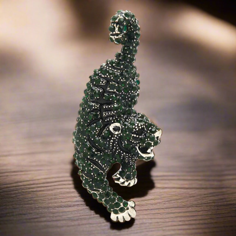 Stylish animal lapel pin with gemstones on a formal suit jacket