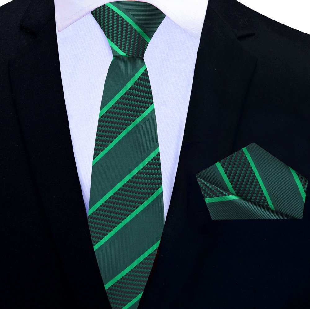 Close-up of classic striped silk necktie in blue and gold shades for business attire