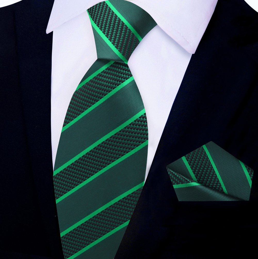 Elegant silk necktie and handkerchief set displayed on a wooden surface for networking events