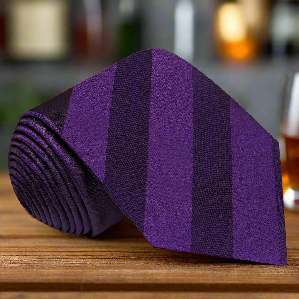 Elegant deep purple silk necktie styled with a suit for formal events
