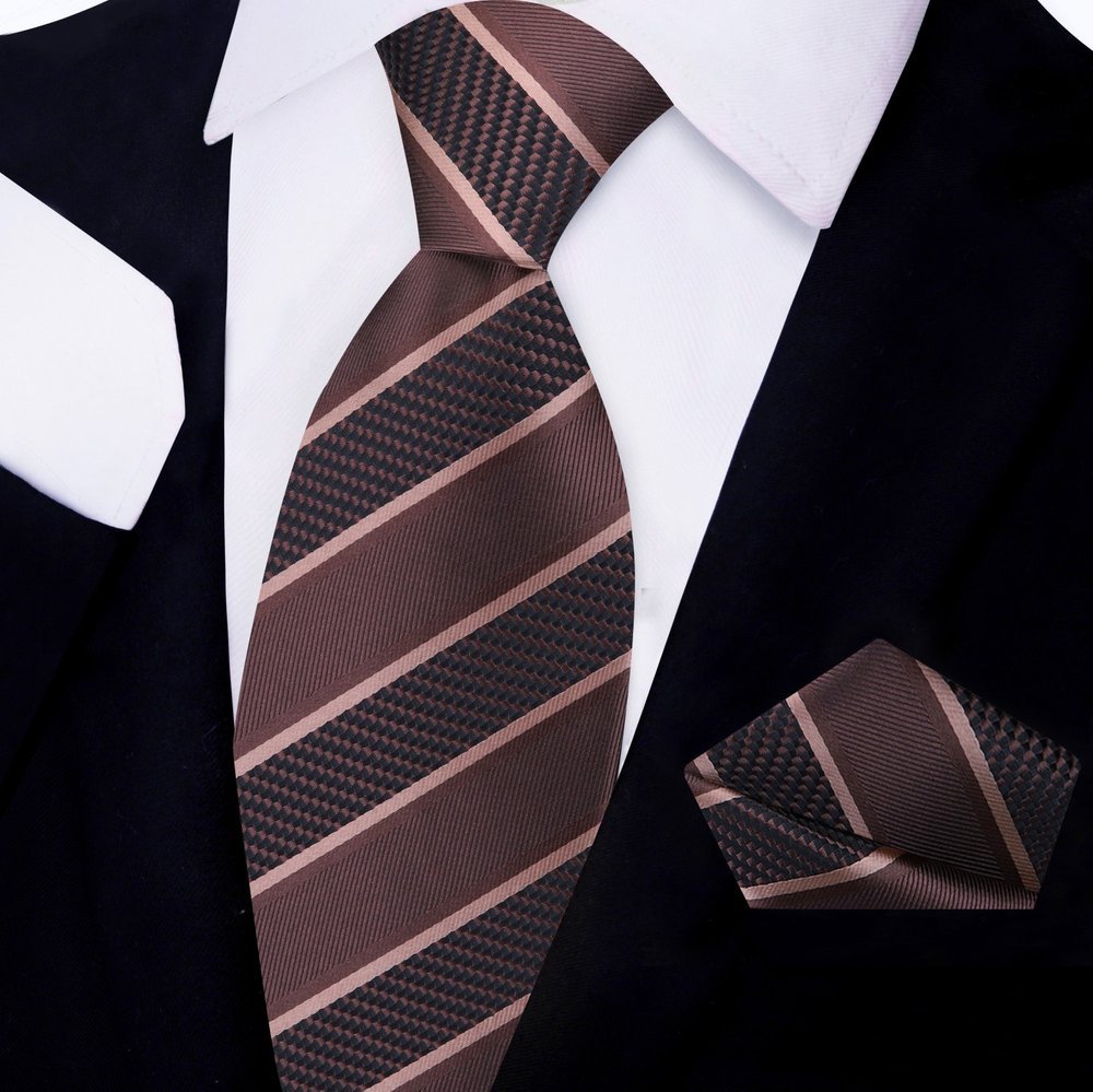 Close-up of classic striped silk necktie in blue and gold shades for business attire