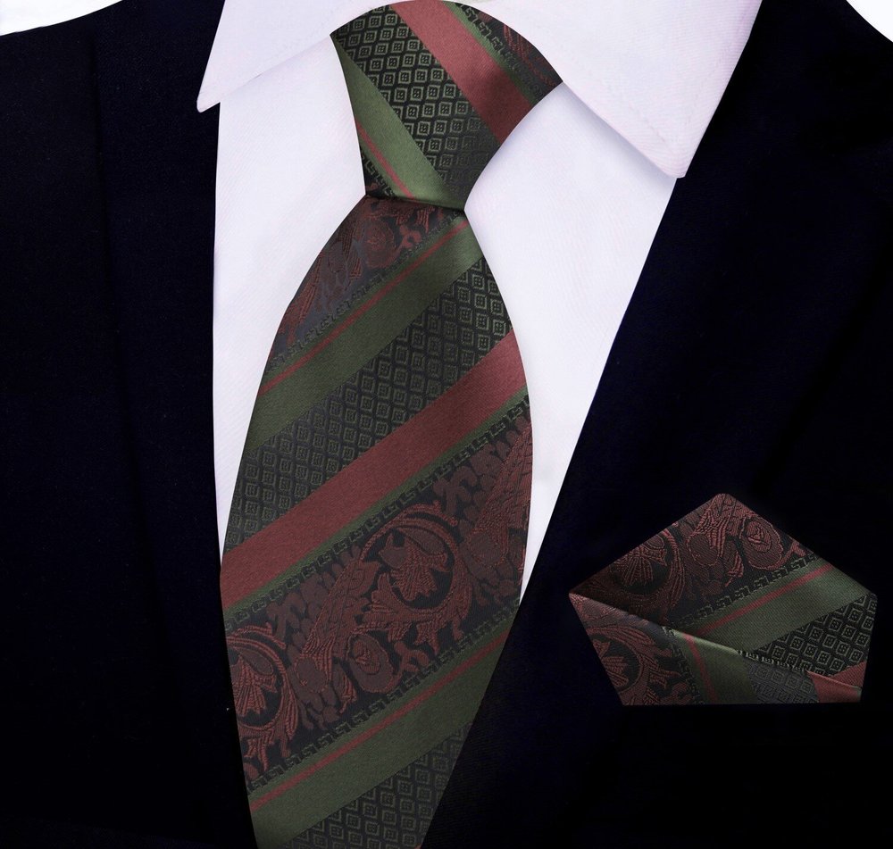 Close-up of the intricate paisley pattern on the brown and mint green silk necktie, showcasing its luxurious texture.