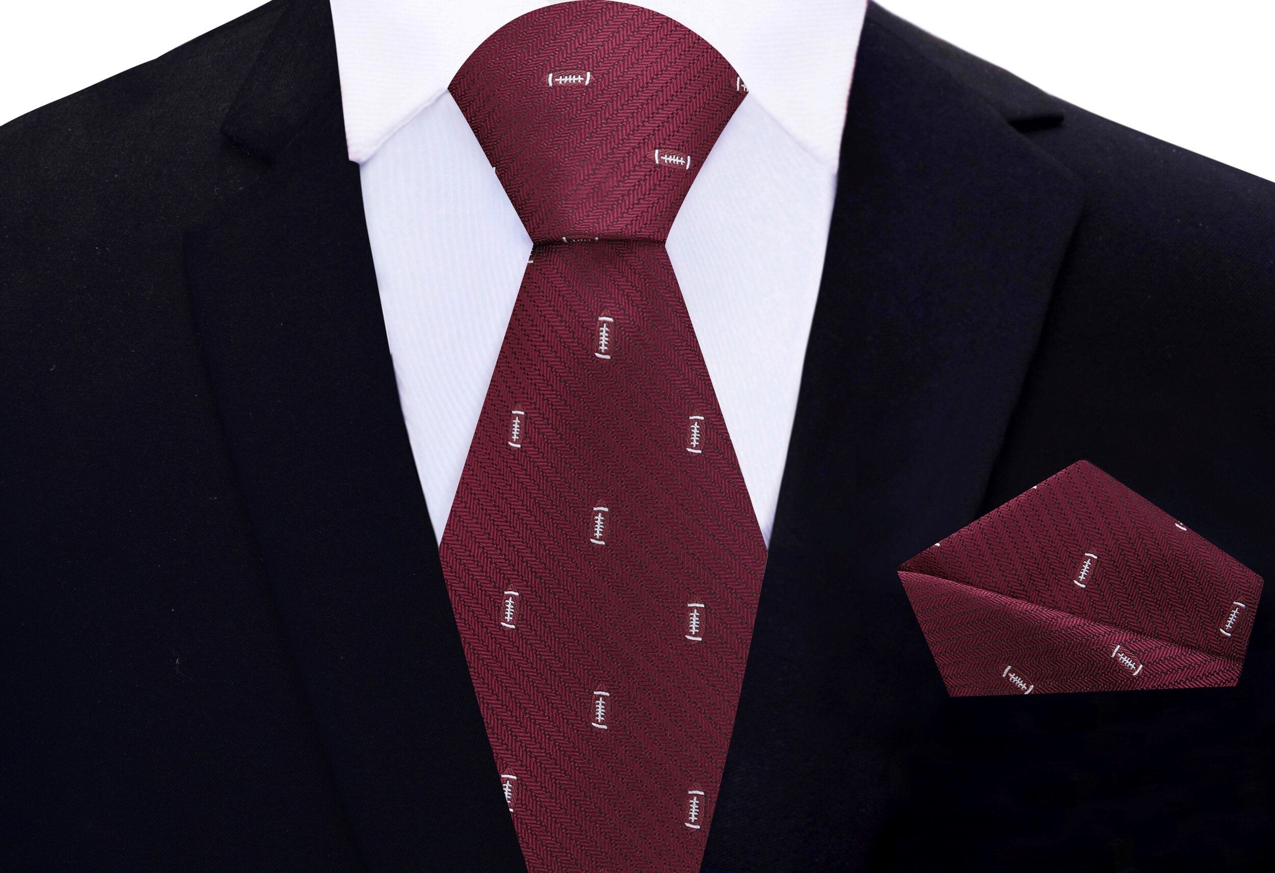 Close-up of the silk tie showing detailed football pattern on blue fabric