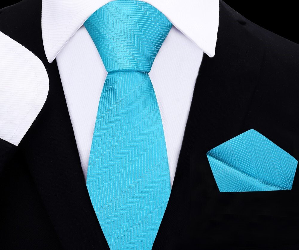 Close-up of electric blue silk kids' necktie with matching pocket square