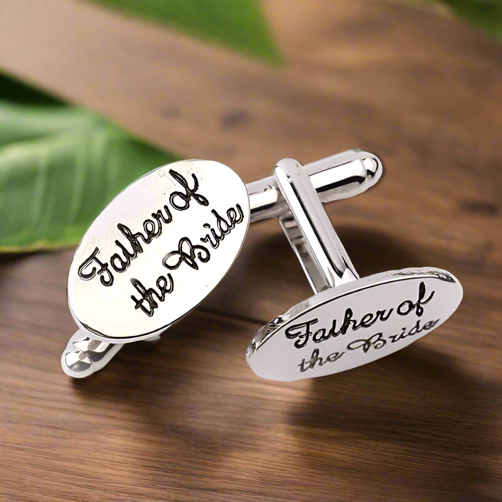Stylish wedding lapel pins featuring titles like Father of the Bride, adding sophistication to the ensemble.
