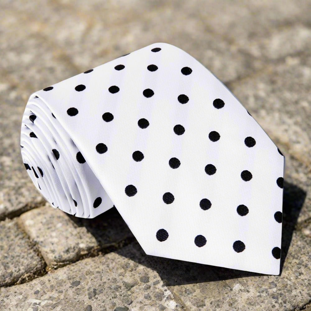 Elegant mens polka dot silk tie in white and black for formal occasions