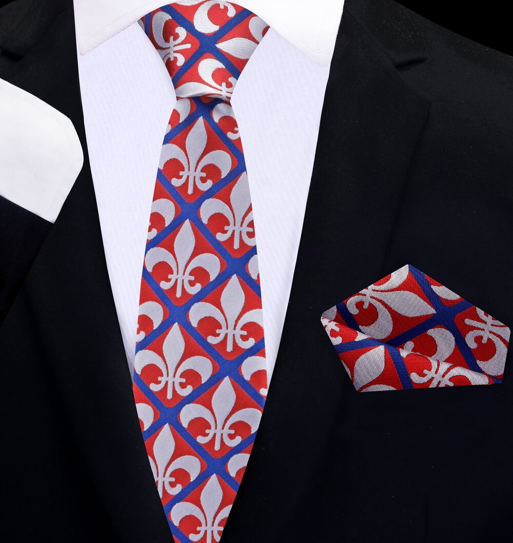 Fleur-de-lis necktie in red, blue, and grey, featuring geometric patterns.