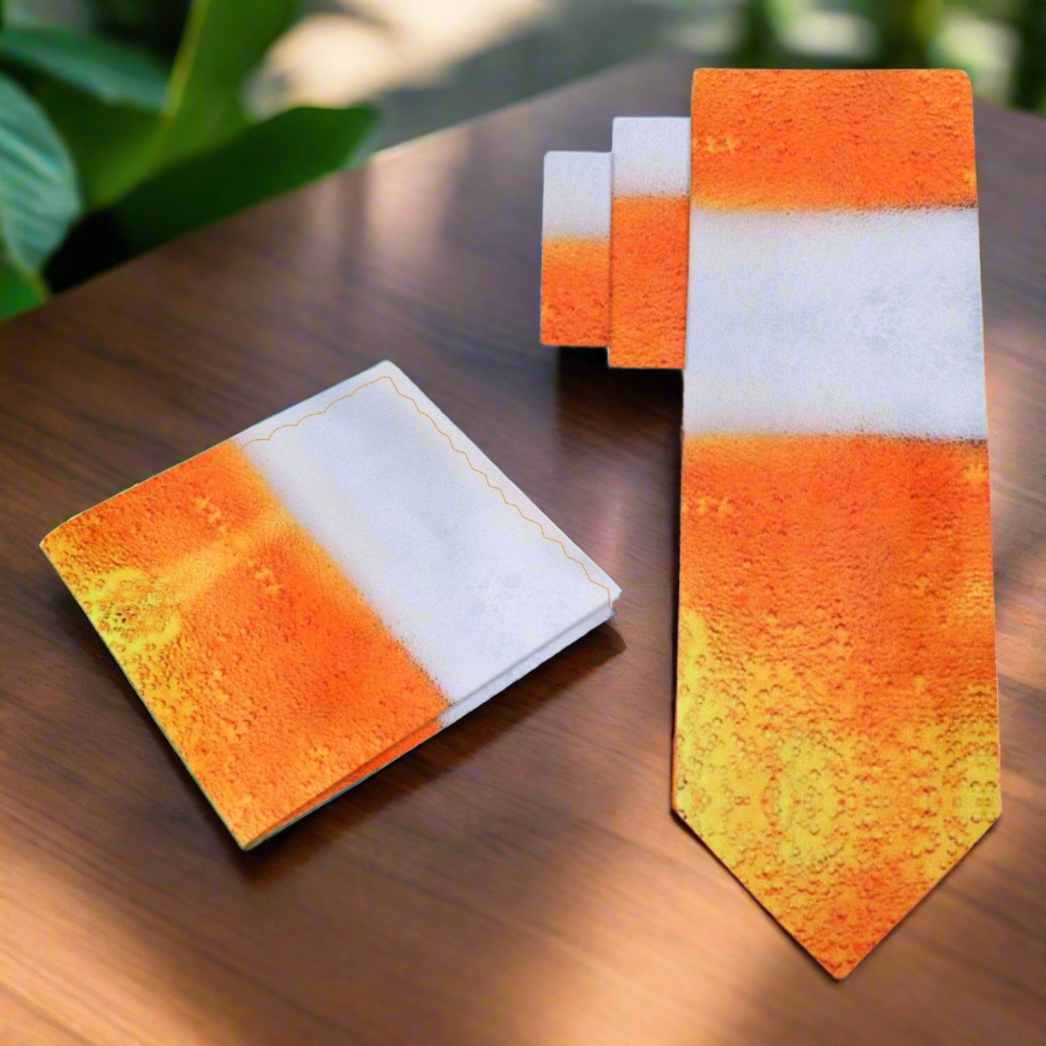 Close-up of the fresh draft beer necktie featuring golden amber colors, perfect for parties.