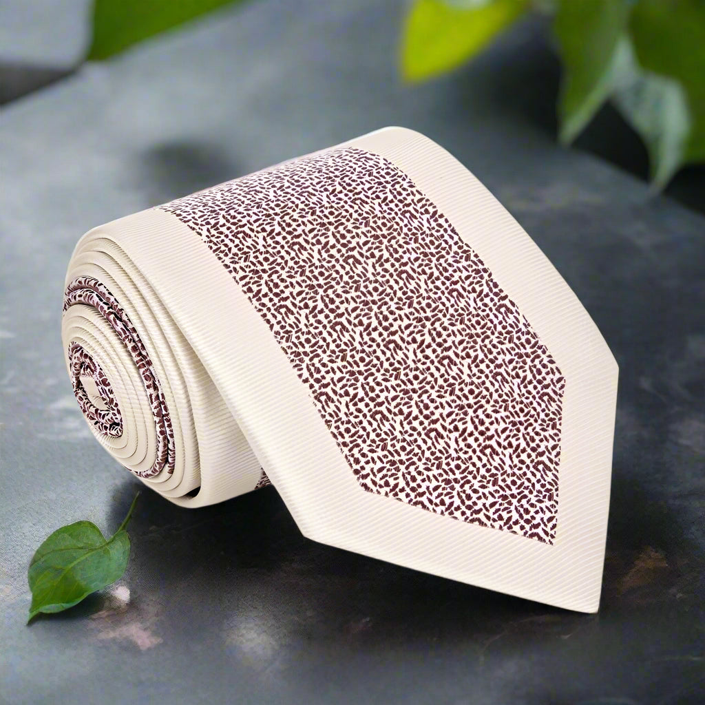 Elegant textured brown silk necktie draped on a hanger for formal occasions