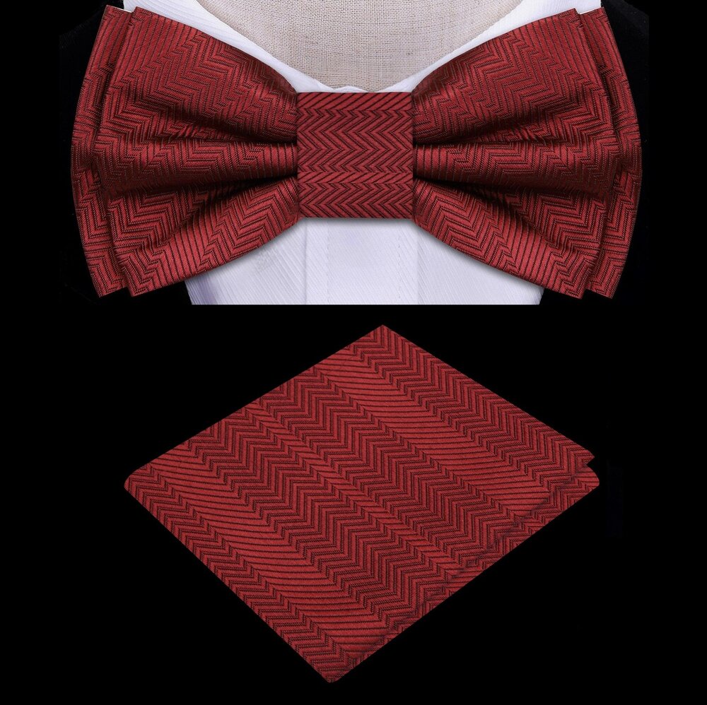 Close-up of the garnet red pre-tied bow tie, showing its texture and color.