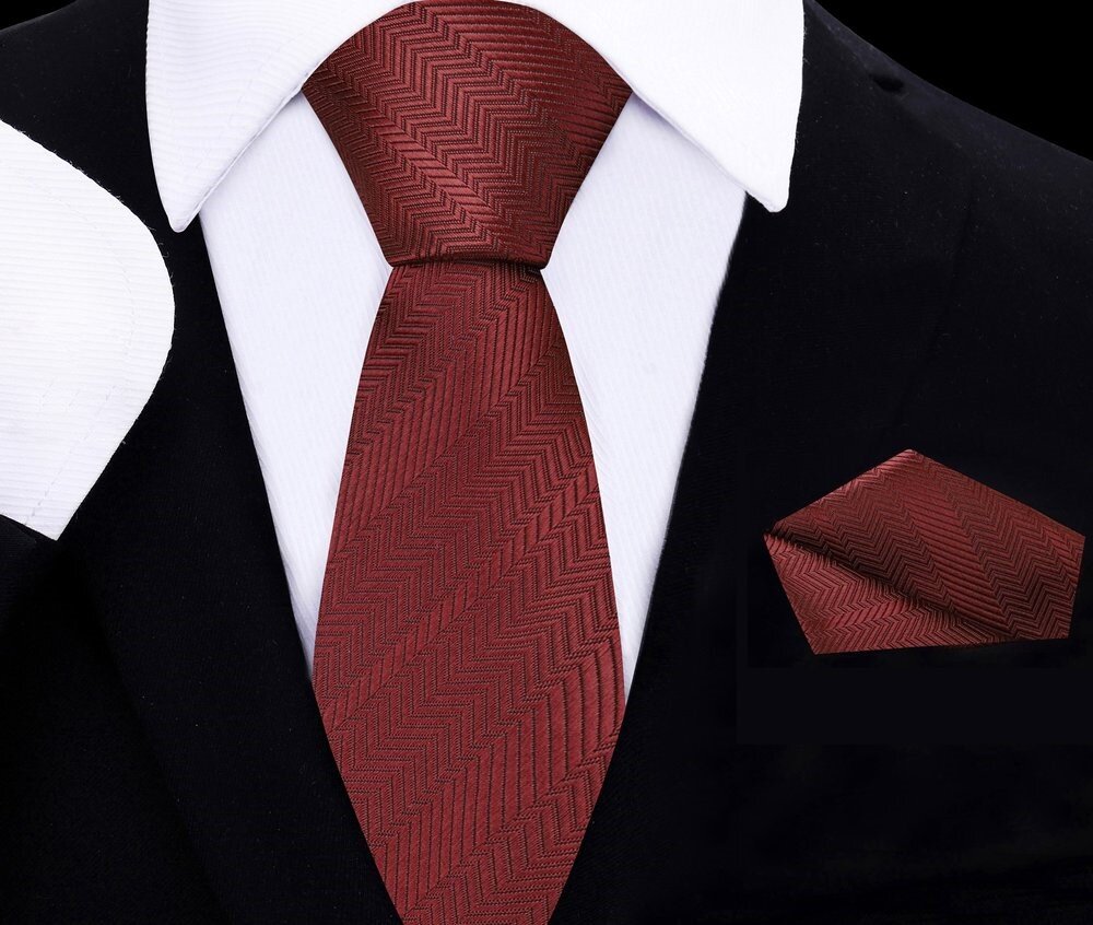 Garnet red necktie and silk pocket square set for kids displayed on a wooden surface.