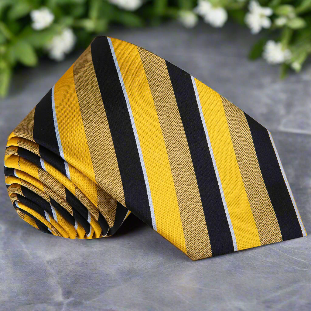 Drexil Luxury Silk Stripe Tie displayed on a wooden table, highlighting its intricate design and color pattern.