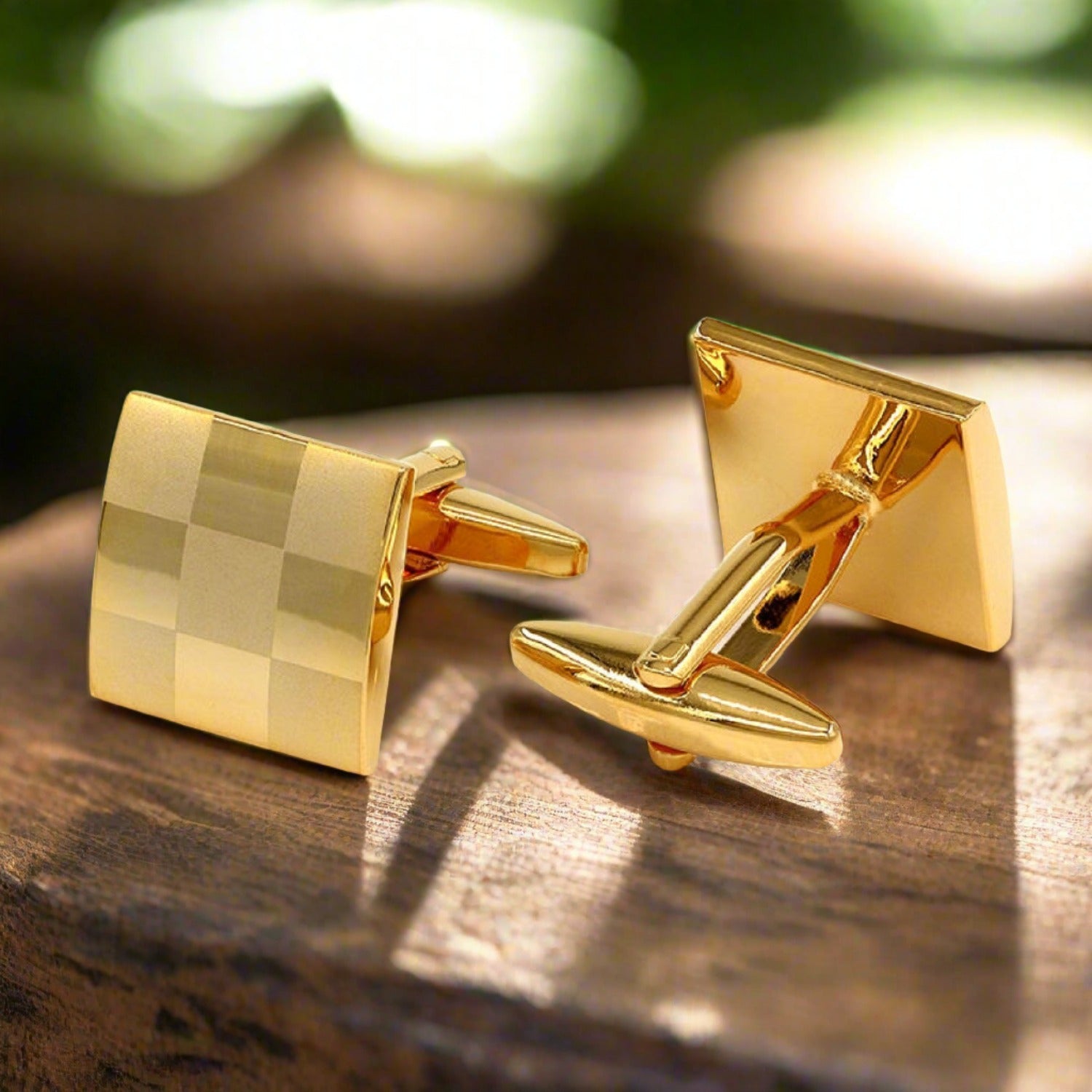 Front view of elegant gold square cufflinks showcasing textured design, ideal for weddings and corporate events.