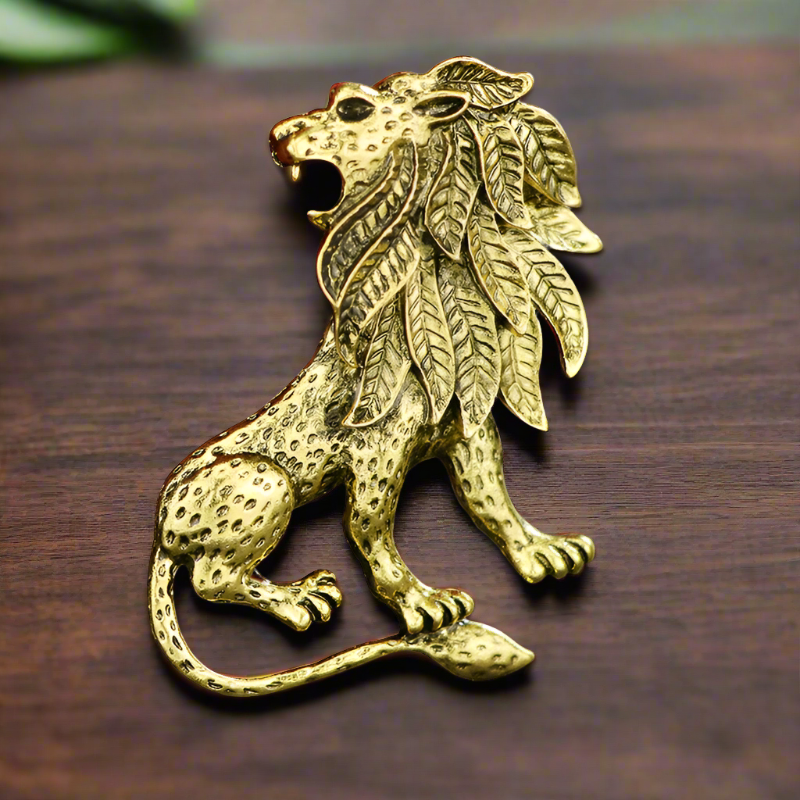 Elegant lion lapel pin in gold with intricate detailing for formal occasions