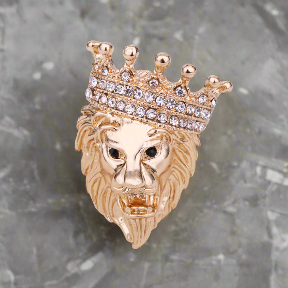 Colorful exotic animal pins with gemstones displayed for gift ideas