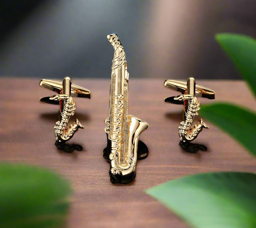 Close-up of gold saxophone cufflinks with intricate design