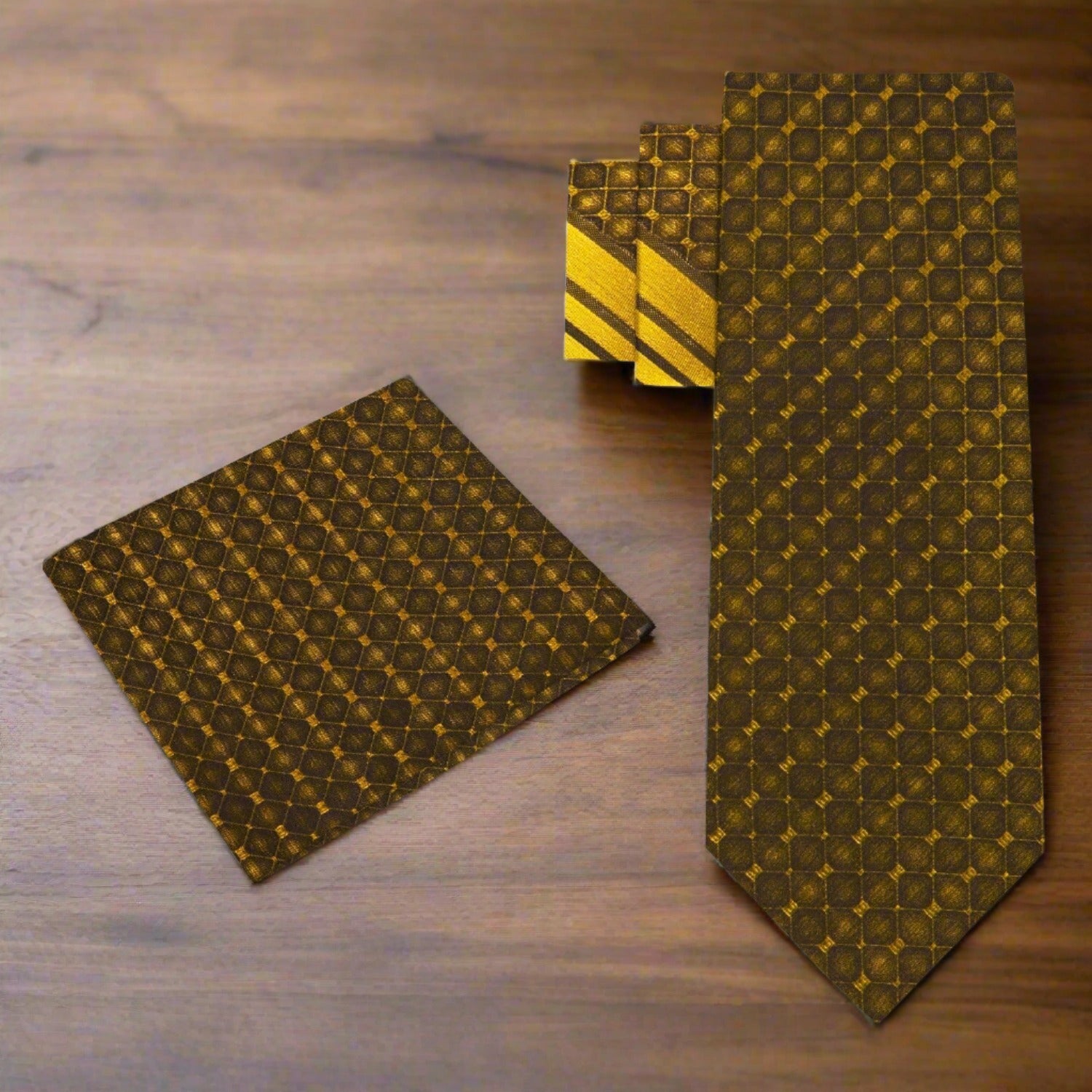 Mens gold stripe tie paired with a navy dress shirt and suit for a wedding