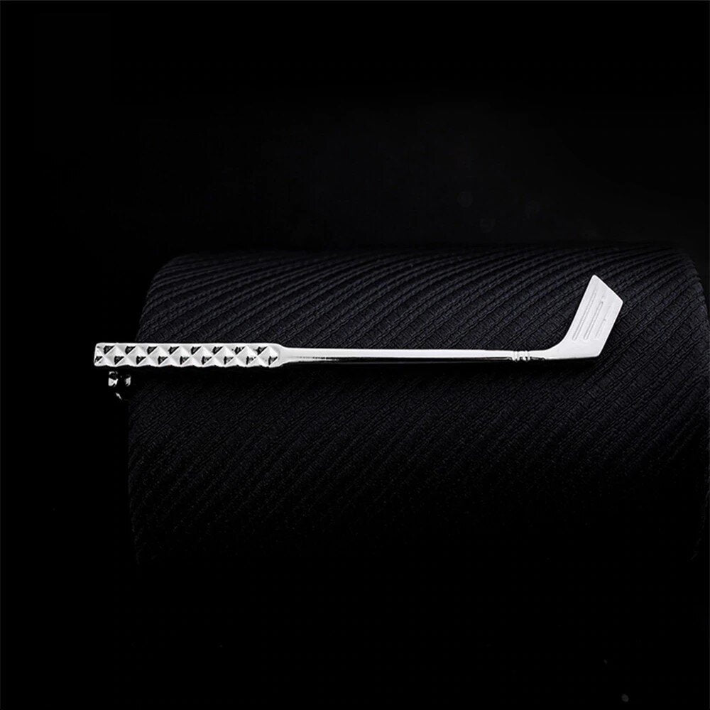 Close-up view of the Arrow-Themed Premium Tie Bar in gold, showcasing its intricate design and shine.