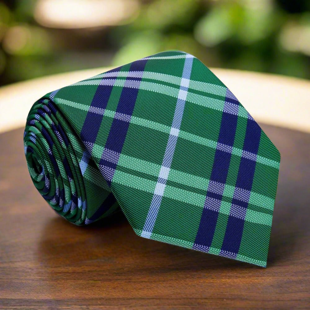 Close-up of green and blue silk plaid tie showcasing texture and weave