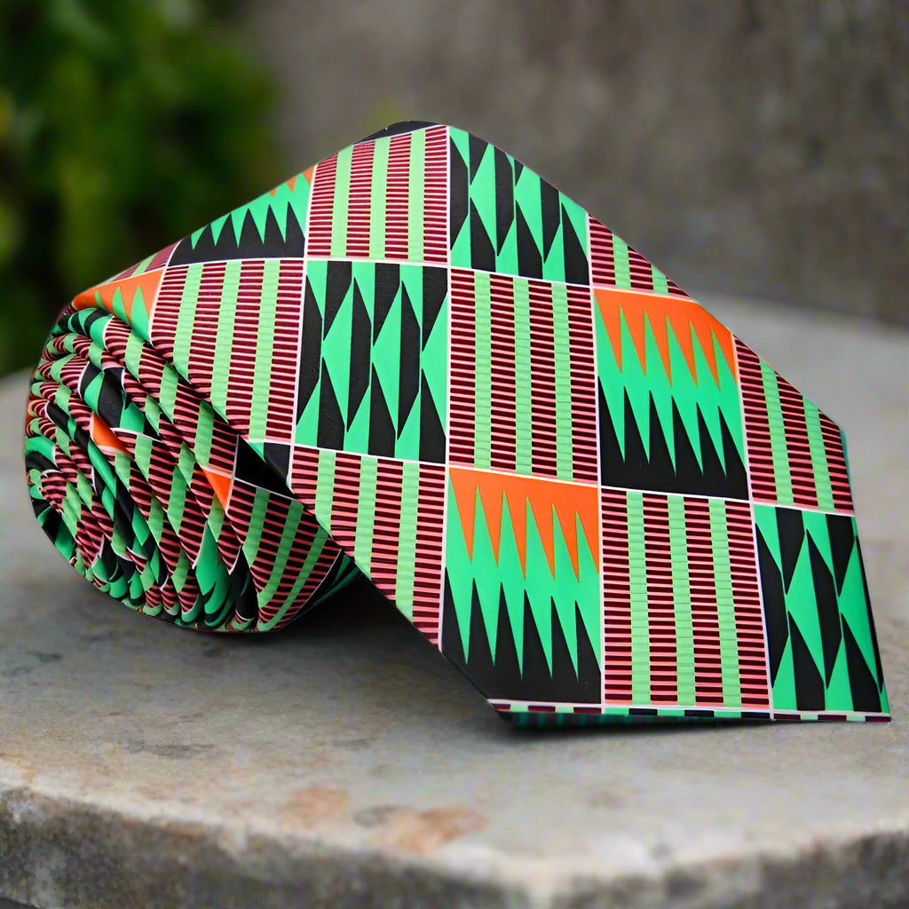 Close-up of vibrant geometric kente silk tie showcasing its intricate pattern