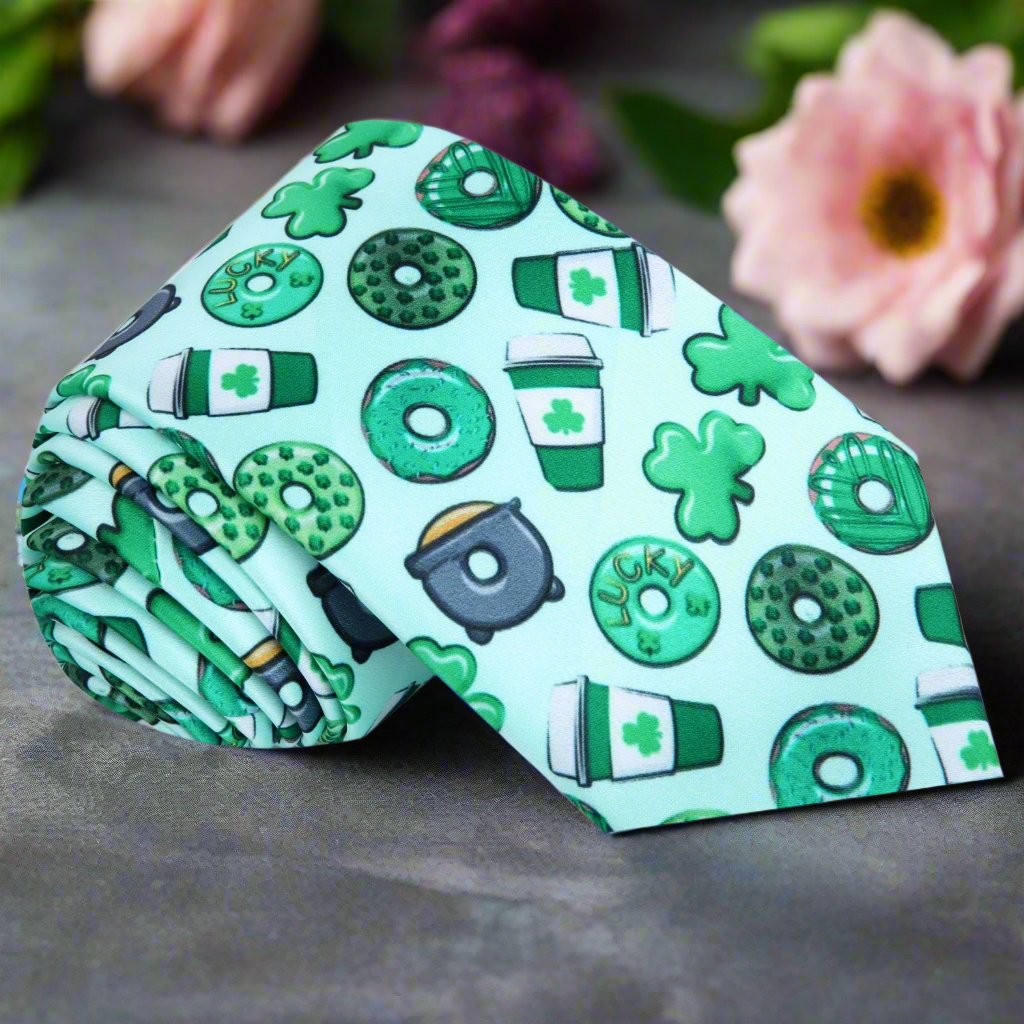 Festive green silk tie featuring clovers, donuts, and coffee for St. Patrick's Day