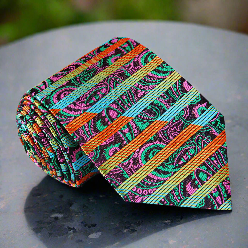 Close-up of vibrant paisley silk tie showcasing intricate patterns and colors.