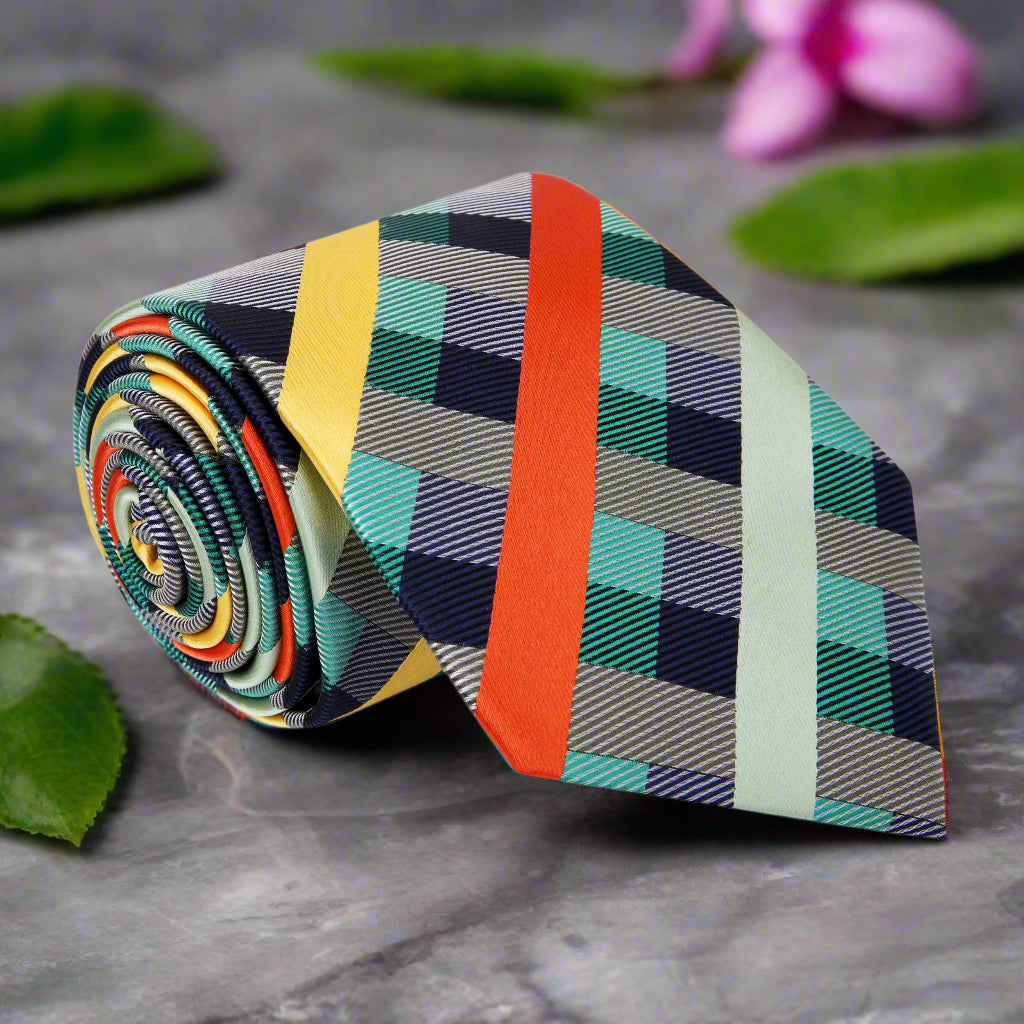 Close-up of the modern geometric check necktie in green and yellow, showcasing its intricate pattern.