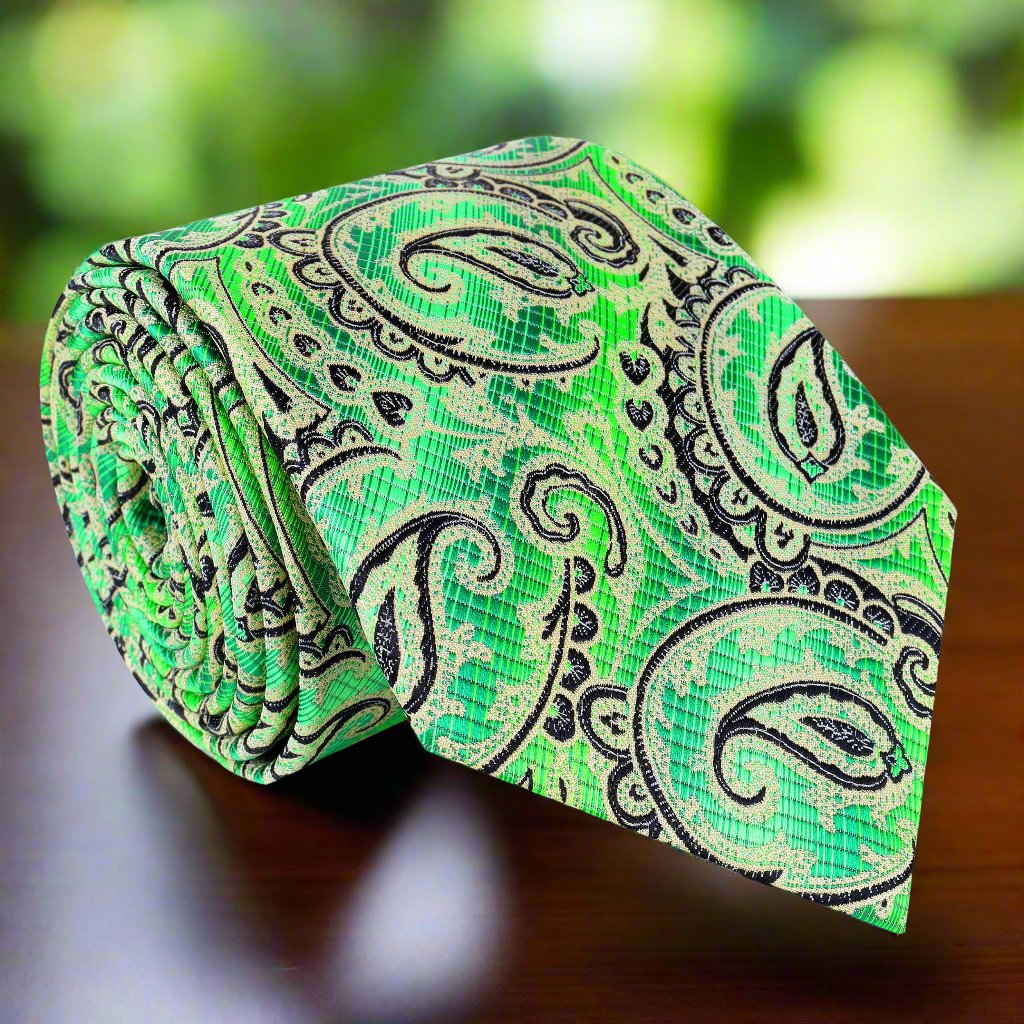 Close-up of vibrant green paisley tie with black pattern, ideal for creative fashion