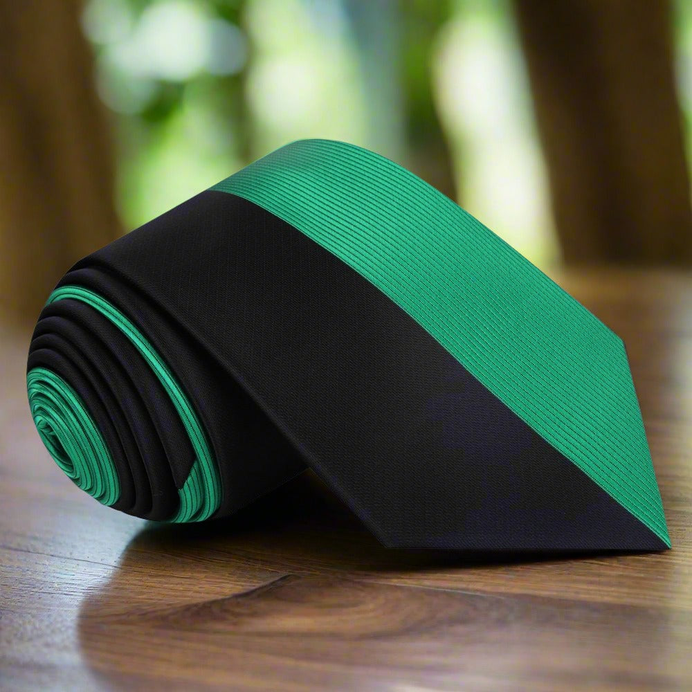 Close-up of the two-toned silk necktie showcasing the center line pattern.