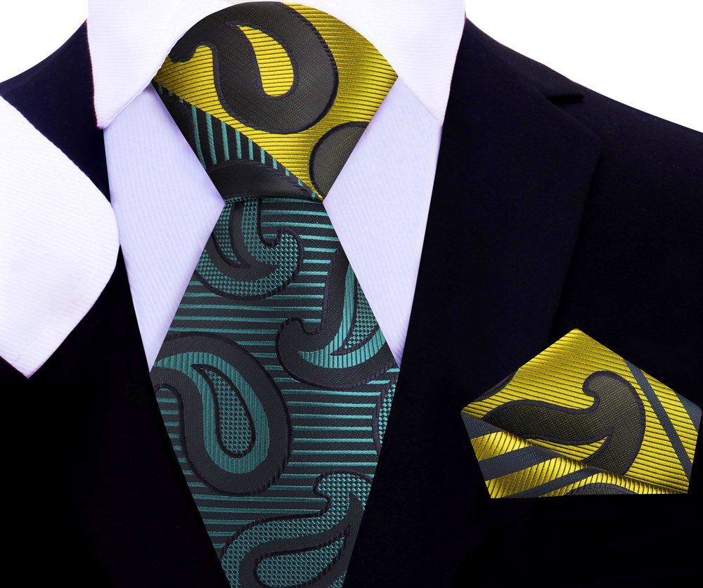 Close-up of a large paisley pattern silk necktie in dark red and black