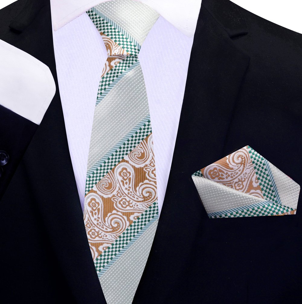 The stylish necktie paired with a crisp white dress shirt for a polished look.
