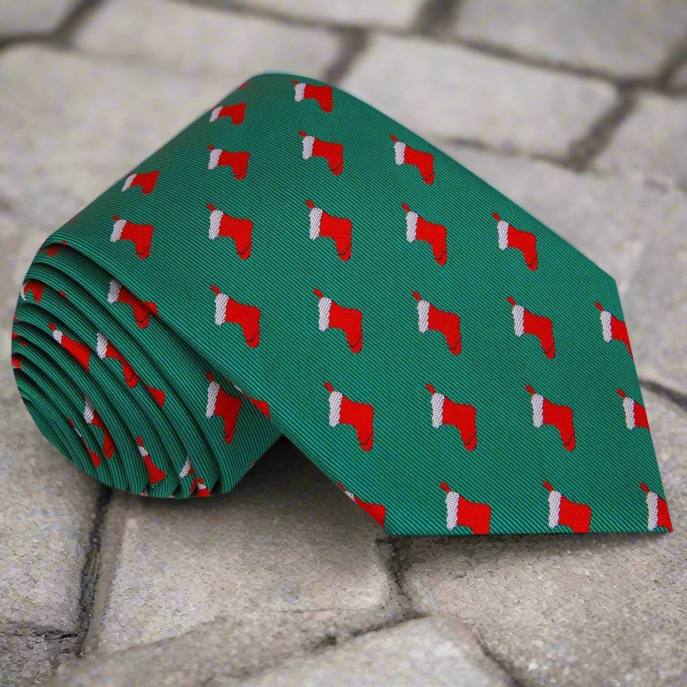 Close-up of Christmas stockings necktie with vibrant colors.