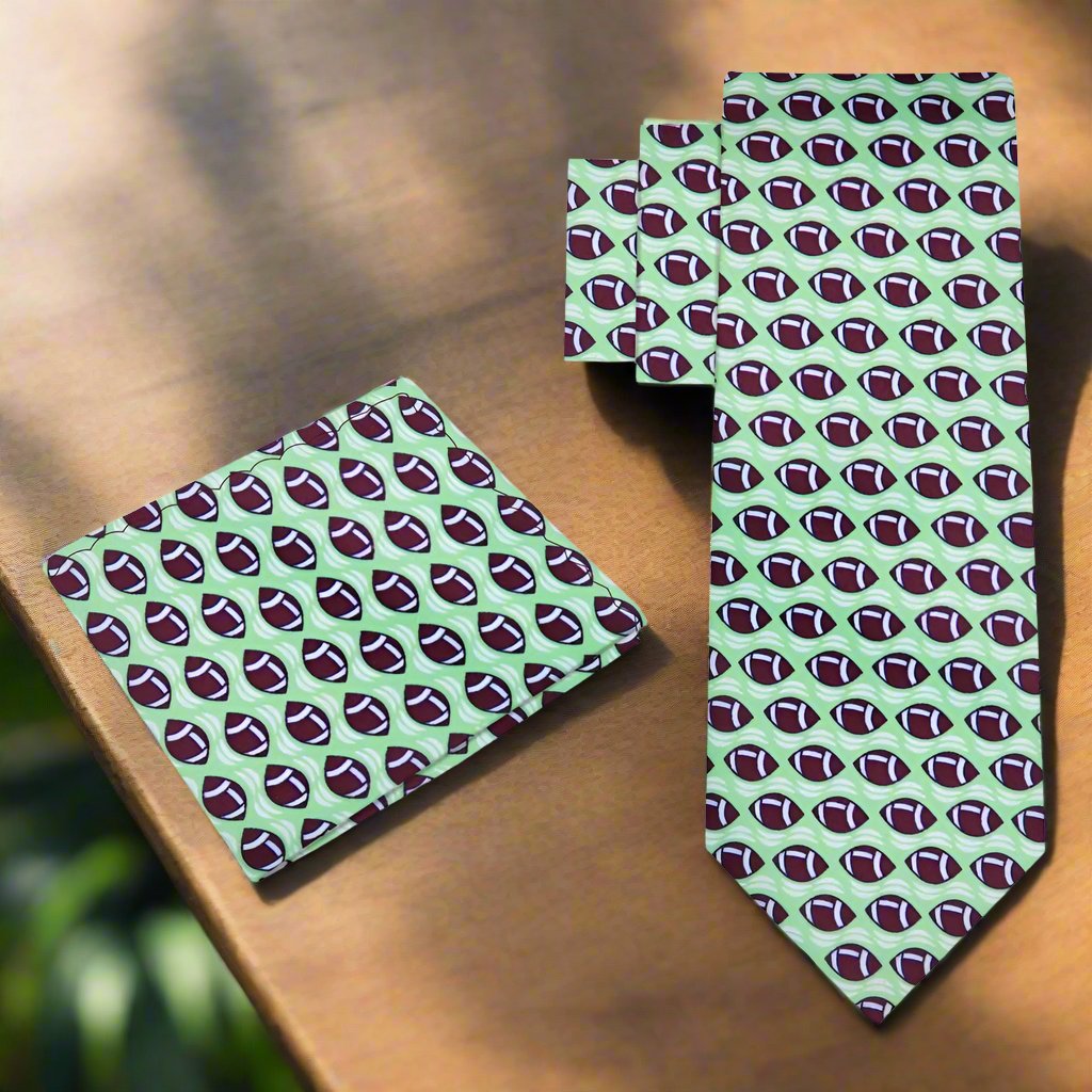 Fashionable blue necktie with football motifs, ideal for game day or casual office wear