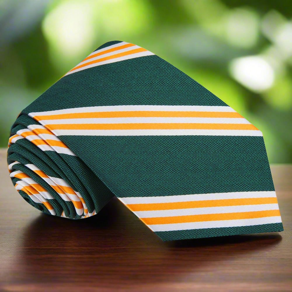 Detailed view of the green striped tie against a navy suit