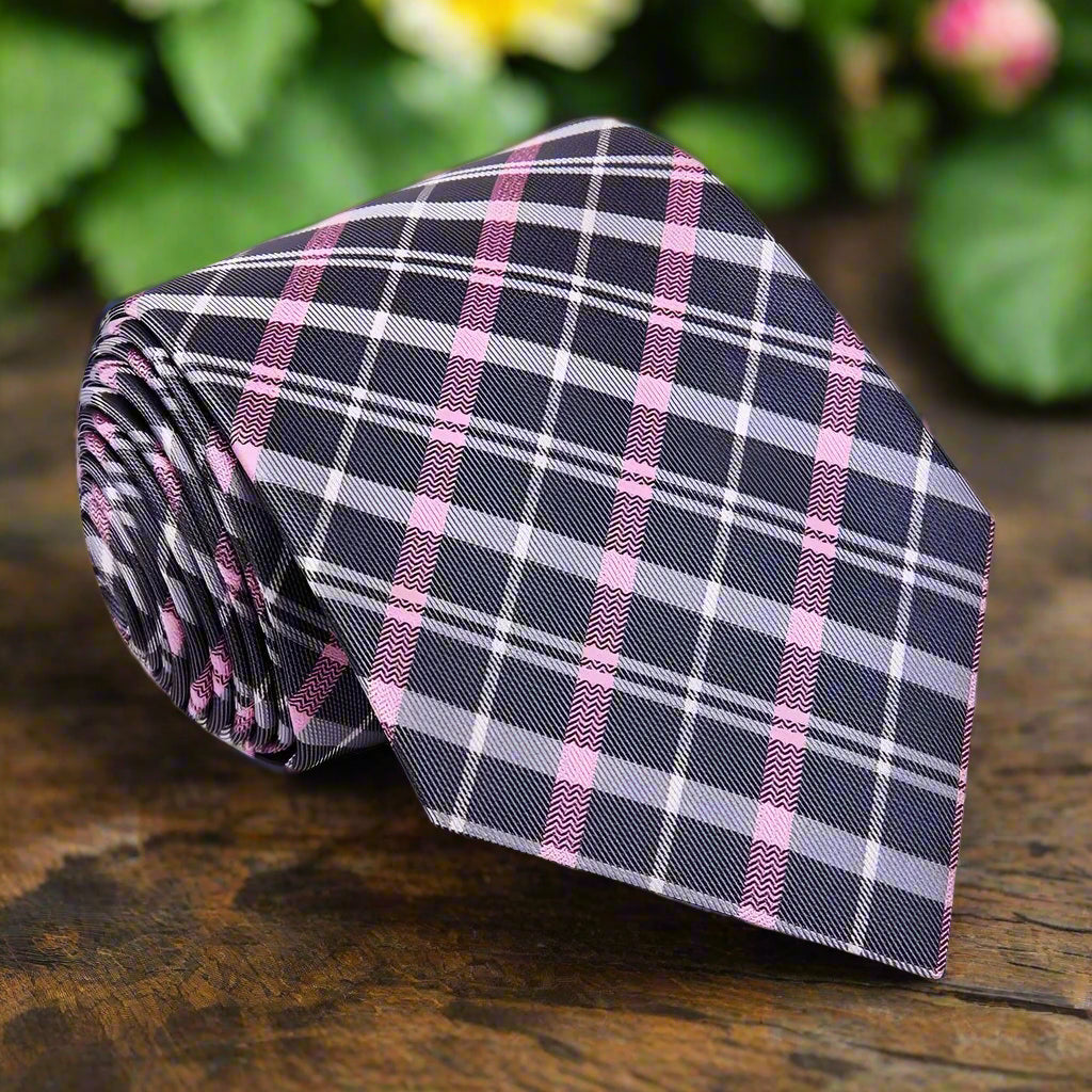 Vivid orange and blue plaid silk necktie styled for wedding attire