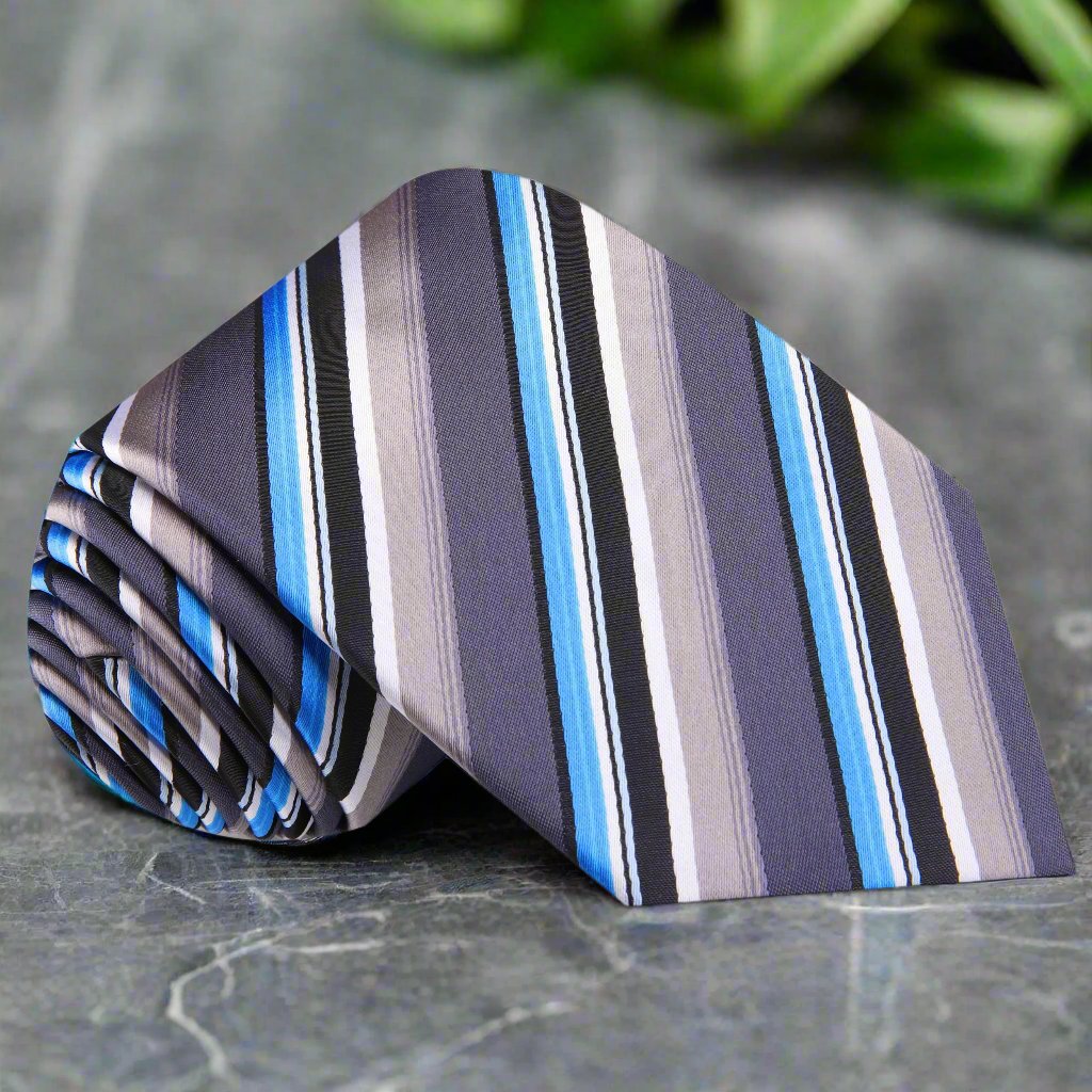 Close-up of the silver striped silk necktie showcasing its elegant pattern.