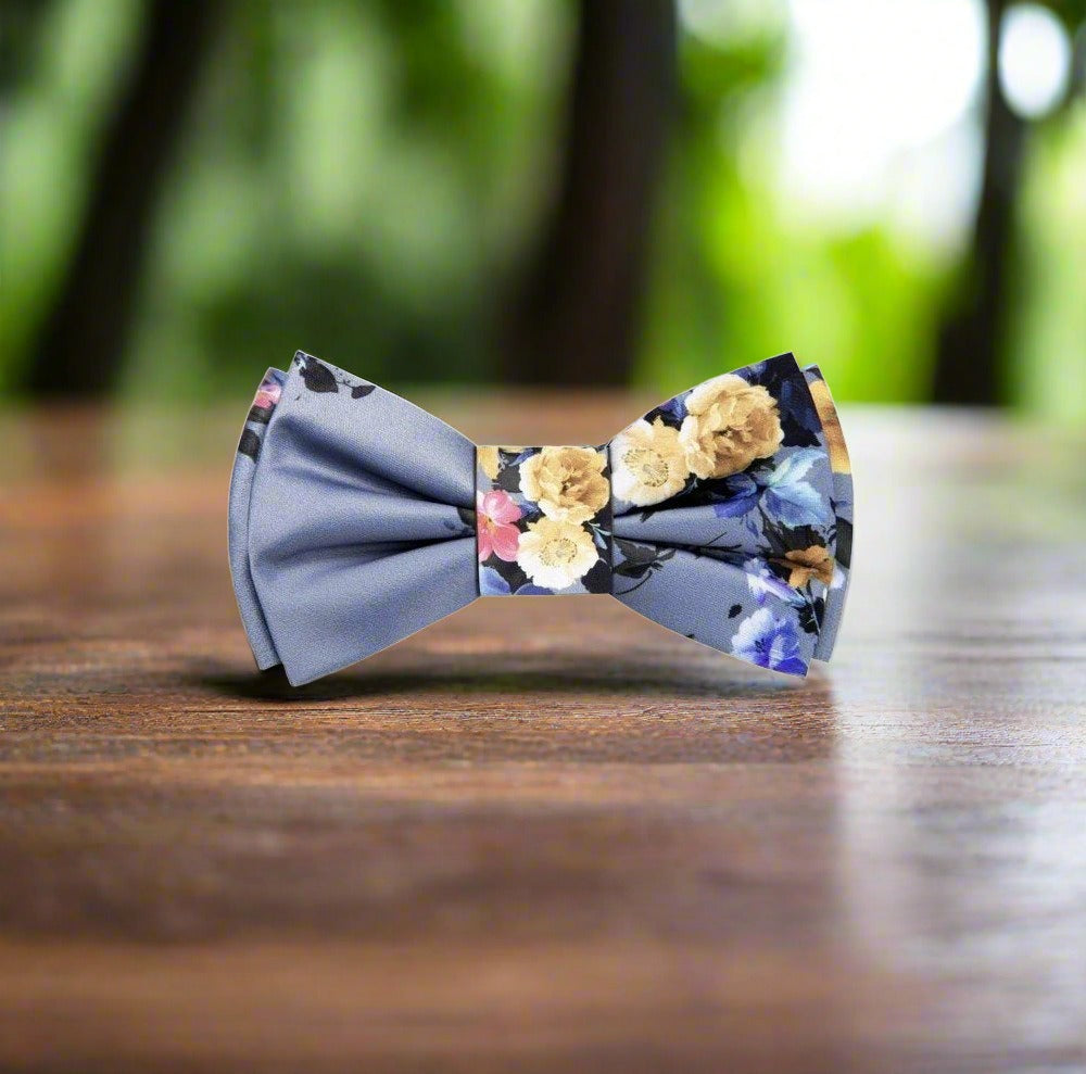 Artistic floral bow tie paired with a white shirt and navy suit for formal events